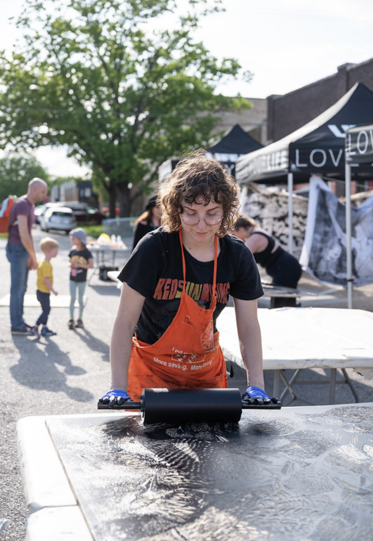 me rolling ink onto my wood block